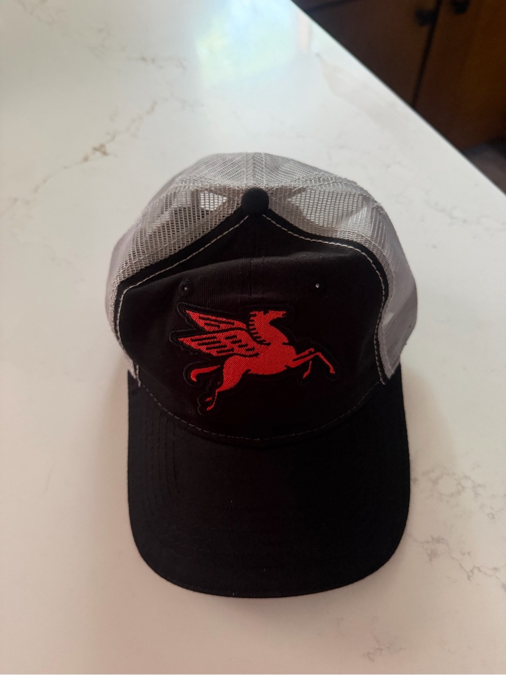 Black and White Trucker Cap with Red Pegasus Embroidery